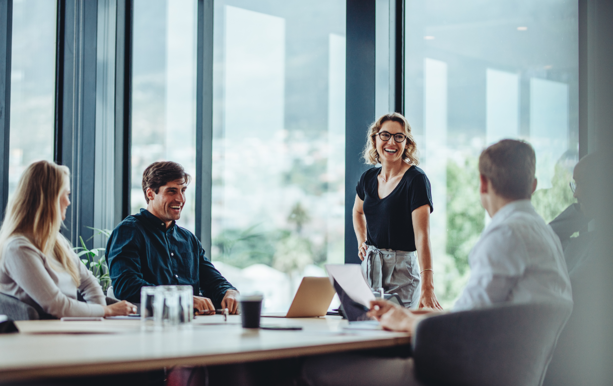 Group of employees in the office having a meeting.