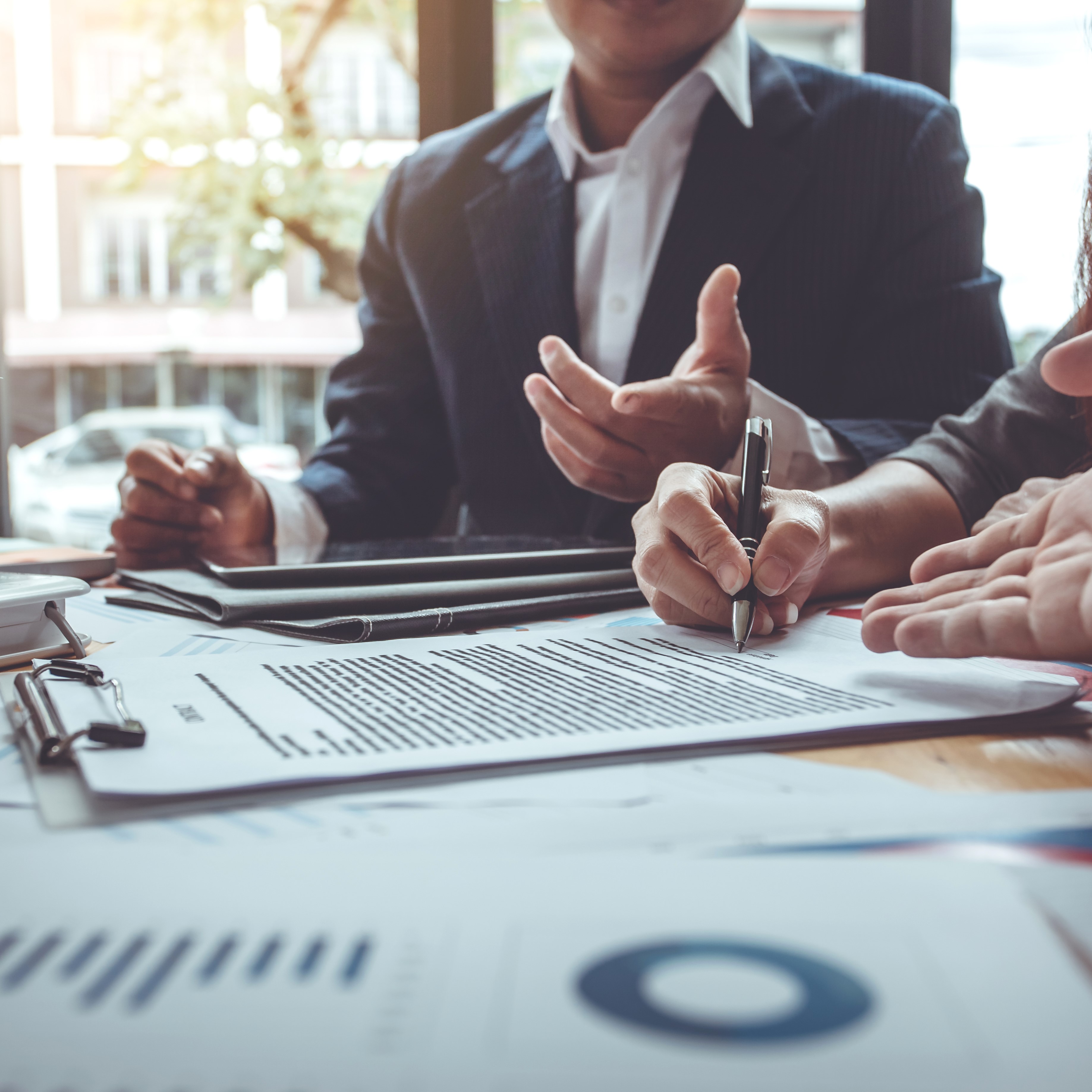 Three lawyers in discussion