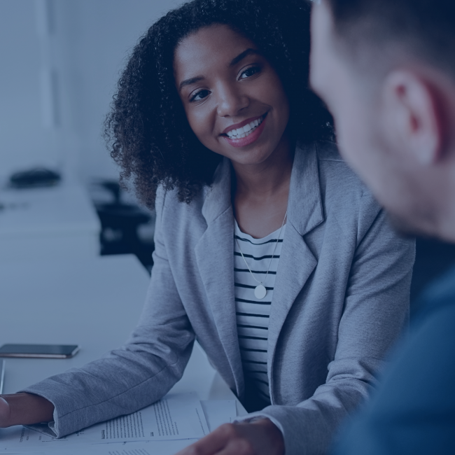 Financial adviser sitting with a customer. 