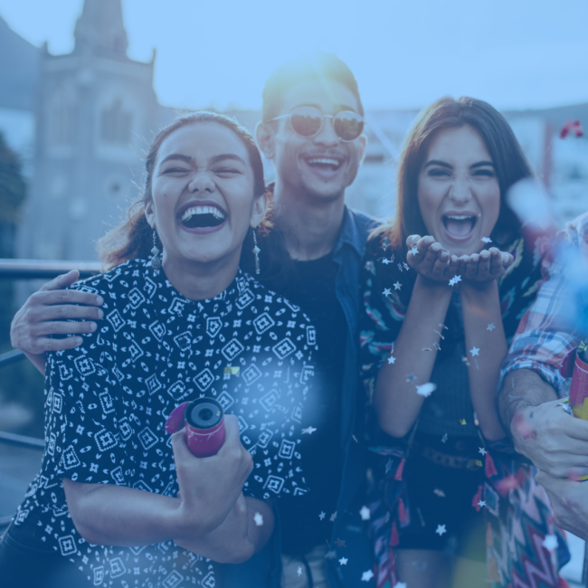 A group of friends in a birthday celebration.