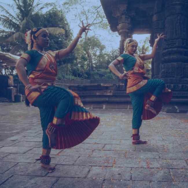3 indian dancers performing a dance routine