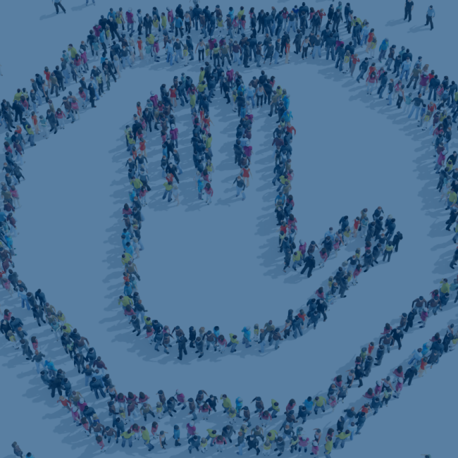 an overhead picture of a stop sign formed by people