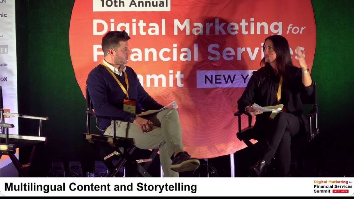 A talk on stage between industry professionals at the Digital Marketing Financial Summit.